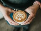 focus photography of coffee artwork